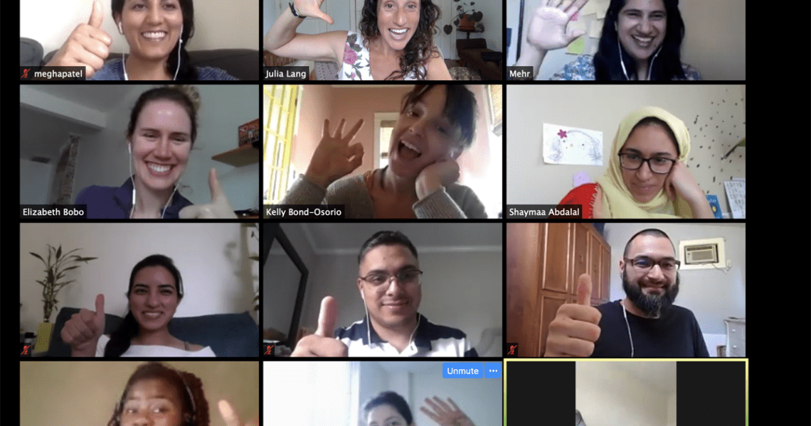 Students And Instructors Smiling In A Screenshot Of A Zoom Meeting.